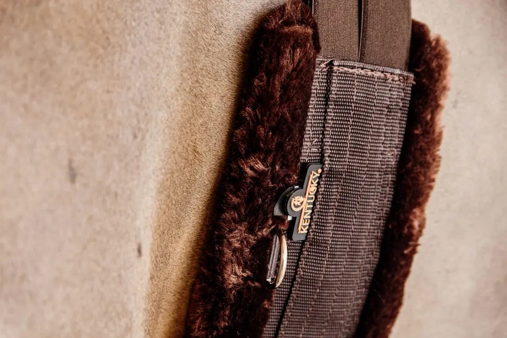 Kentucky Horsewear nylon girth with brown sheepskin brown